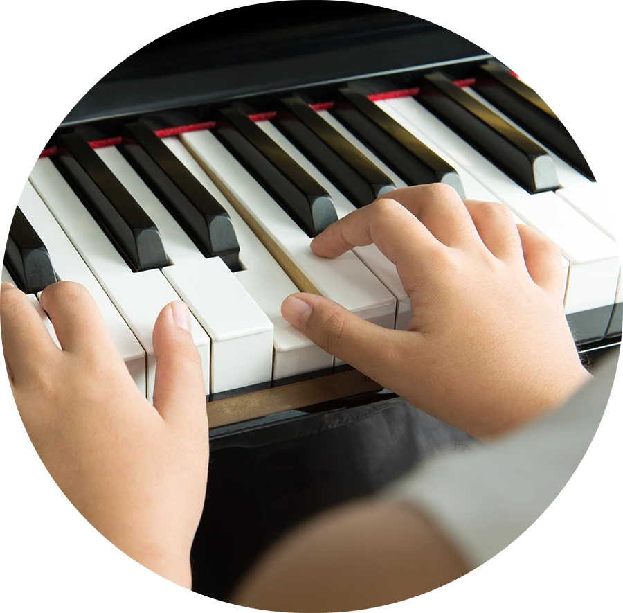 Student playing piano