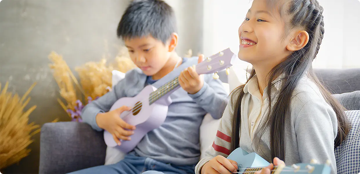 Playing Happy Birthday on a ukulele