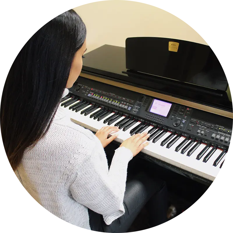 Student playing piano